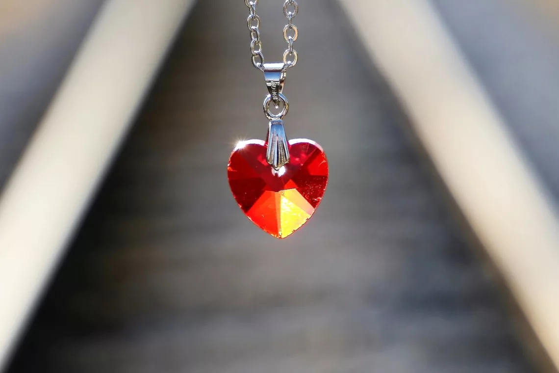 red heart medallion, love symbol, lost love-3523612.jpg
